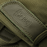 M-Tac Handsker Assault Tactical Mk.2 i læder med synlige syninger og M-Tac logo, fremhæver detaljerne i det taktiske design.