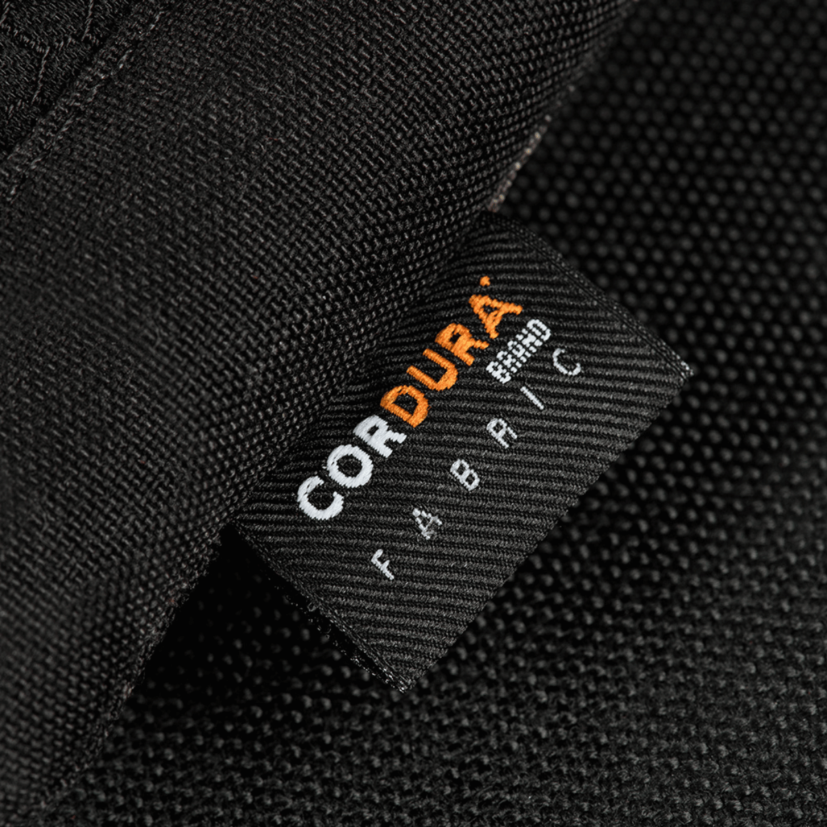 Nærbillede af M-Tac Smartphone Taske Elite Medium Hex fremstillet af CORDURA HEX 1000D stof med slidstærkt design.