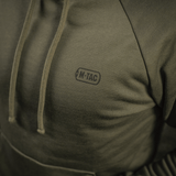 M-Tac Cotton Raglan Hard Hoodie i 100% bomuld med fleecefor, stilfulde raglanærmer og kængurulomme. Perfekt til efterår og vinter.