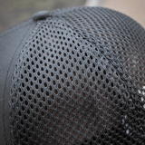 Nærbillede af mesh panel på M-Tac Mesh Flex Ripstop Baseball Cap, viser ventilationsdesignet for optimal komfort udendørs.