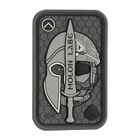 M-Tac Patch Molon Labe 3D PVC med spartansk hjelm design, sort 3D PVC patch med velcro bagpå, perfekt til taktisk udstyr eller uniformer.