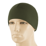 M-Tac Rip-Stop Fleece Hjelmliner i olivengrøn, bæres af mannequin, slidstærk og let, ideel til køligt og koldt vejr, behagelig og holdbar.