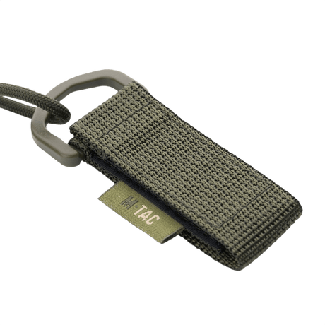 M-Tac Safety Cord med D-ring til sikring af udstyr, spiralformet paracord og PVC, MOLLE-montering, forhindrer tab eller tyveri af genstande.