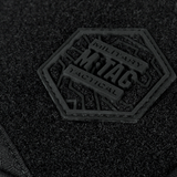 Nærbillede af M-Tac Sling Pistol Taske Elite Hex med Velcro logo i sort Cordura-materiale