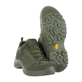 M-Tac Sneakers Tactical Demi-Season Pro Line i oliven farve med Vibram-sål, designet til taktiske aktiviteter og udendørs eventyr.