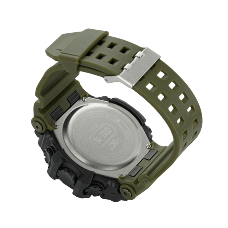 M-Tac Tactical Ur 2037 set bagfra med stålbagcover og grøn rem, vandtæt til 5ATM, robust design til udendørs brug.