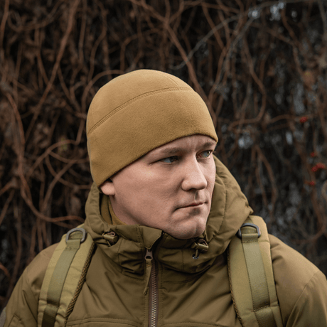M-Tac Fleece Watch Cap Light Polartec hue i beige, perfekt til vinterbrug, med holdbar og varm Polartec Micro Series fleece.