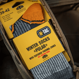 M-Tac Sokker Polar Merino 40% i rygsæk, ideel til udendørs aktiviteter, varme og komfort med merinould, acryl, nylon og elastan.