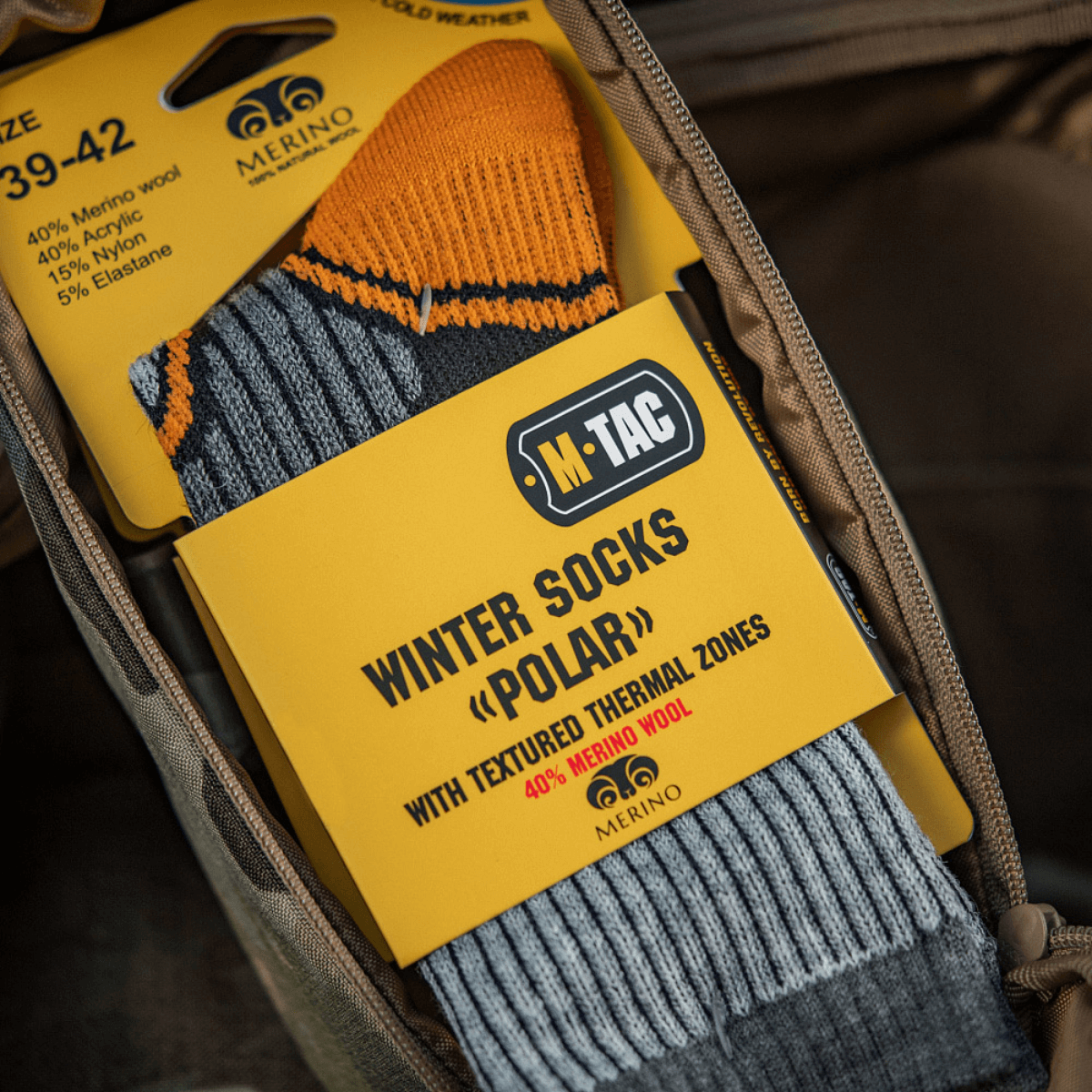 M-Tac Sokker Polar Merino 40% i rygsæk, ideel til udendørs aktiviteter, varme og komfort med merinould, acryl, nylon og elastan.