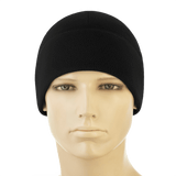 Sort M-Tac Watch Cap Elite Fleece Beanie Hat Slimtex på mannequin hoved, ideel til koldt vejr og taktisk brug, lavet af holdbar fleece og Slimtex.