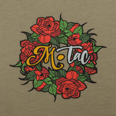 M-Tac T-Shirt Motanka med farverigt blomstermønster på brystet, fremhævet af M-Tac logo, symboliserer ukrainsk kulturarv.
