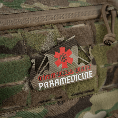 M-Tac Patch Viking Evac med vikingeskib og "Odin Will Wait Paramedicine" tekst i camouflagebaggrund.